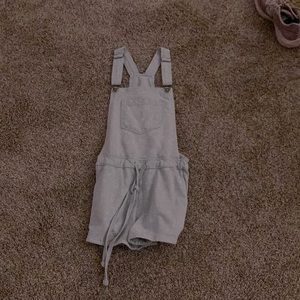 Its Overalls, Light Blue with White, Kids Small and the Brand is Wallflower.